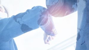 Global connection through greeting. Each culture does it different, image depicting two people greeting each other through an elbow bump, wearing world map clothing.